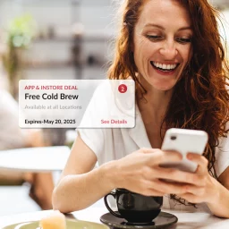 Woman viewing notification on phone
