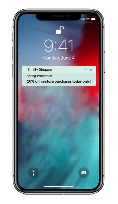A Thrifty Shopper push notification on a phone lock screen