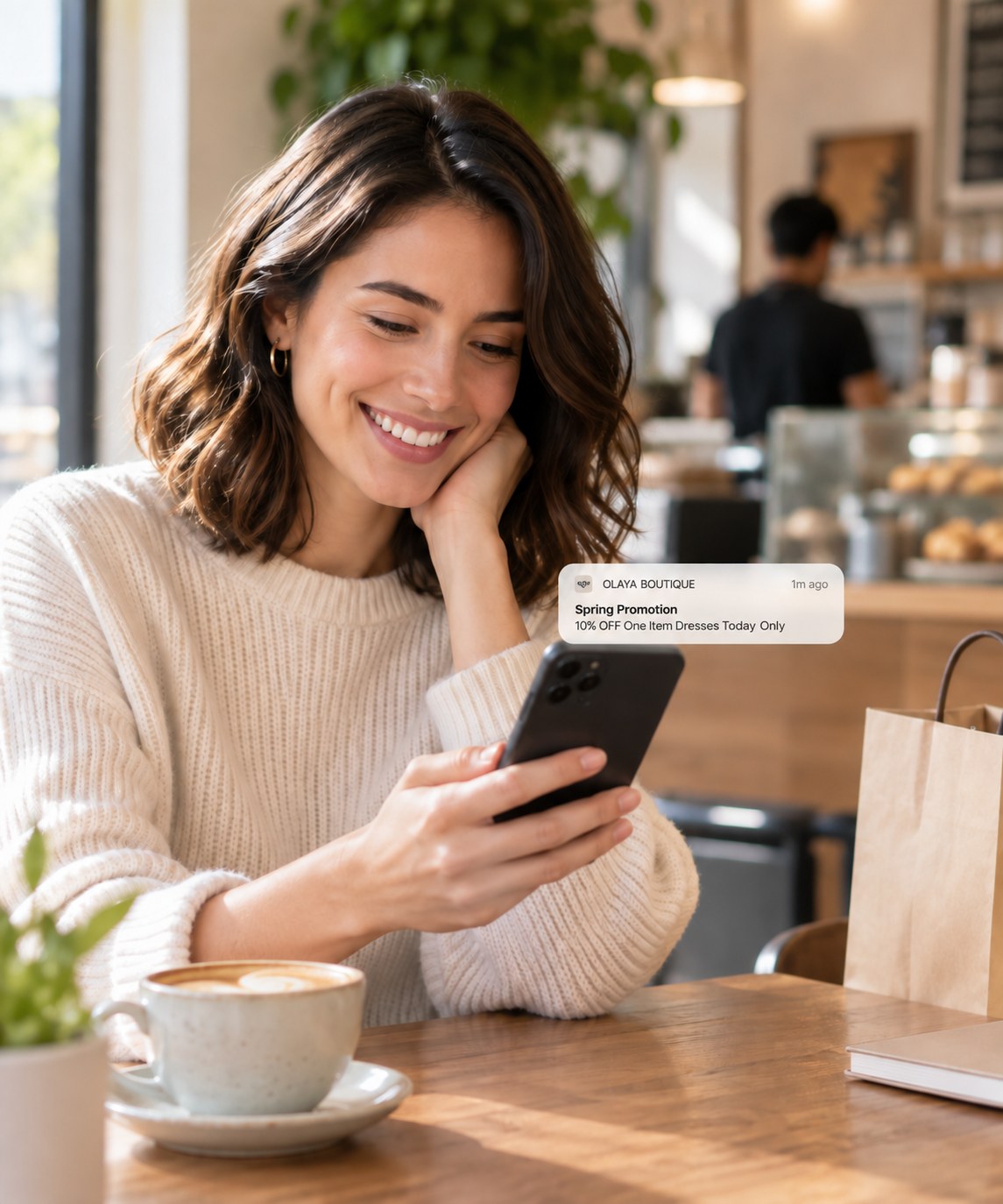 A regular reading a personalized message in a café