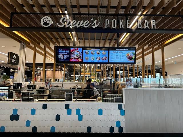 Steve's Poke Bar counter and menu boards